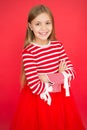 Family and love. childrens day. small girl child. School education. Good parenting. Child care. happy little girl on red Royalty Free Stock Photo