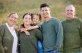 Family love is a special type of love. a multi-generational family spending time together outdoors. Royalty Free Stock Photo