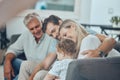 Family, love and together with generations in living room, happy with parents, child and grandfather in family home