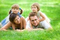 Family lying on grass Royalty Free Stock Photo