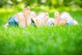 Family lying on grass