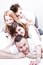 Family lying on mattresses