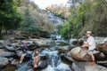The family at Mae Ya Waterwall, Inthanon National Park, Chiangmai, Thailand Royalty Free Stock Photo
