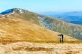 Family make photo on autumn mountain plateau Royalty Free Stock Photo