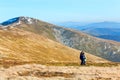 Family make photo on autumn mountain plateau Royalty Free Stock Photo