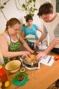 The family makes a supper. Royalty Free Stock Photo