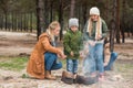 young family making campfire Royalty Free Stock Photo