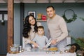 Family making cookies at home Royalty Free Stock Photo