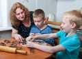 Family making gingerbread cookies