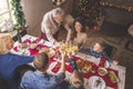 Family making a toast at Christmas dinner Royalty Free Stock Photo