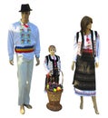 Family Mannequins in national traditional balkanic, moldavian, romanian costumes isolated over white