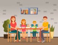 Family meal time. Dad, mom and kids at the table in modern dining room. Home cozy interior