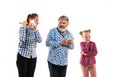Family members arguing with one another on white studio background. Royalty Free Stock Photo
