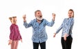 Family members arguing with one another on white studio background. Royalty Free Stock Photo