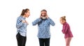 Family members arguing with one another on white studio background. Royalty Free Stock Photo