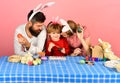 Family members wearing bunny ears. Mother, father and daughter Royalty Free Stock Photo