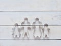 Family metal cookie or biscuit cutter used to cut dough in particular shape composed of father, mother, brother, and sister over r