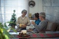 Family with mixed generations from young to senior celebrate christmas together at home with happiness and love - grandfathers and