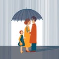 Family mom dad and daughter are standing under an umbrella Royalty Free Stock Photo