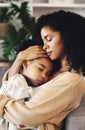 Family, mom with sleeping child and love, peace and calm with relationship, care and relax at home. Content, black woman