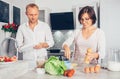 Family moments concept image - married prepare meal together