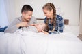 The family morning in the bedroom on the bed mom dad son Royalty Free Stock Photo