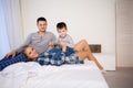 The family morning in the bedroom on the bed mom dad son Royalty Free Stock Photo