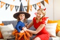 Family mother and child daughter getting ready for halloween, Royalty Free Stock Photo