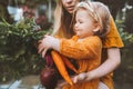 Family mother and child girl with organic vegetables healthy eating lifestyle Royalty Free Stock Photo
