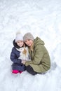 Family mother and child girl on winter walk in nature Royalty Free Stock Photo