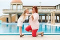 Family. Mother and daughter have fun together by the pool. Concept of single mothers and summer vacations Royalty Free Stock Photo