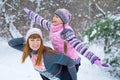 Family of mother and daughter outdoors