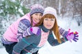 Family of mother and daughter outdoors