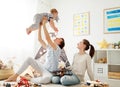 Family mother father and son playing together in children`s pl Royalty Free Stock Photo