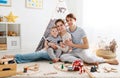 Family mother father and son playing together in children`s pl Royalty Free Stock Photo