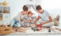 Family mother father and son playing together in children`s pl Royalty Free Stock Photo