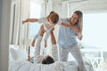 Family, mother and father lifting girl, playing and bonding in home bedroom. Love, support and happy man and woman Royalty Free Stock Photo