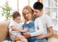 Family - mother, father and little boy expecting Royalty Free Stock Photo