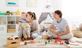 Family mother father and son playing together in children`s pl Royalty Free Stock Photo