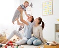 Family mother father and son playing together in children`s pl Royalty Free Stock Photo