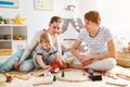 Family mother father and son playing together in children`s pl Royalty Free Stock Photo