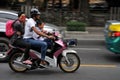 Family on a Motorcycle in Central Bangkok Royalty Free Stock Photo