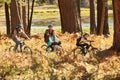 Family mountain biking past lake, Big Bear, California, USA