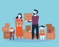 Family moving into a new house with boxes Royalty Free Stock Photo