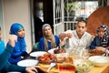 Family, muslim and home in dinner for eid or ramadan on table for religion to enjoy and satisfied. Faith, Islam and Royalty Free Stock Photo