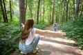 Family and nature concept - Attractive young woman have fun with her little daughter in the park Royalty Free Stock Photo