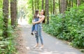 Family and nature concept - Young woman hold little daughter girl Royalty Free Stock Photo