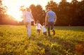 Family in nature together, back view Royalty Free Stock Photo