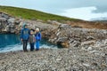 Family near reservoir Storglomvatnet (Meloy, Norge)