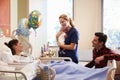 Family And Nurse With New Born Baby In Post Natal Department Royalty Free Stock Photo